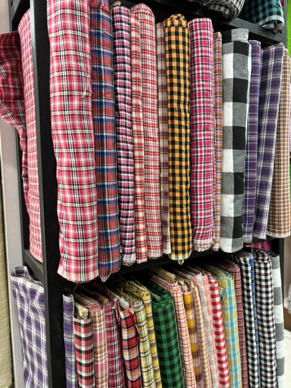 Large collection of colourful check fabrics
